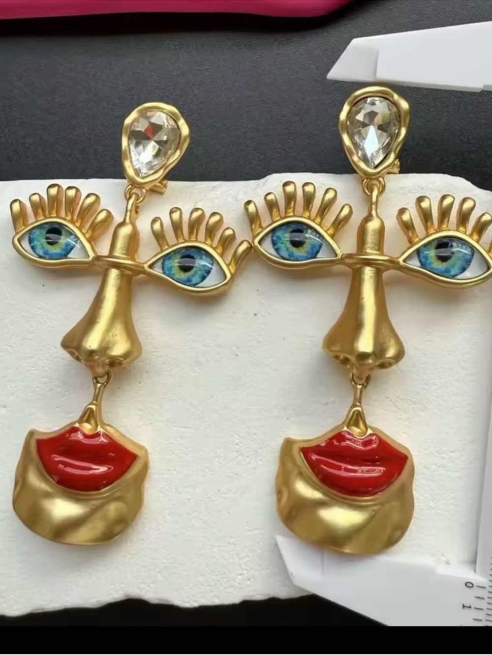 Gold Face Statement Earrings with Blue Eye and Red Lip Accents